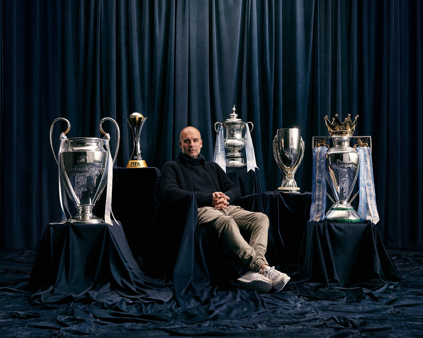 Pep Guardiola comemorando um título pelo Manchester City