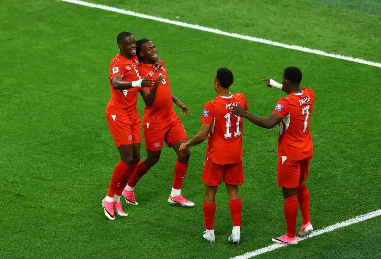 Jogador Johan Manzambi em ação durante partida da Copa do Mundo entre Suíça e Argélia.
